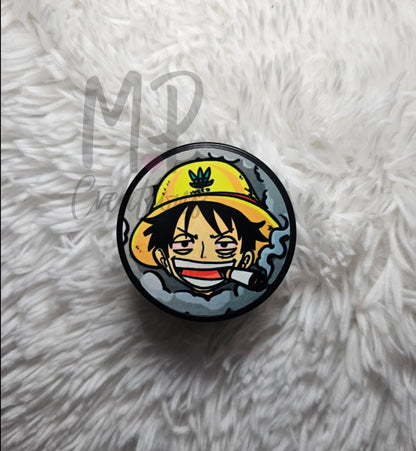 One Piece Luffy Grinder and Zippo Lighter featuring Luffy's vibrant yellow hat, perfect for collectors.